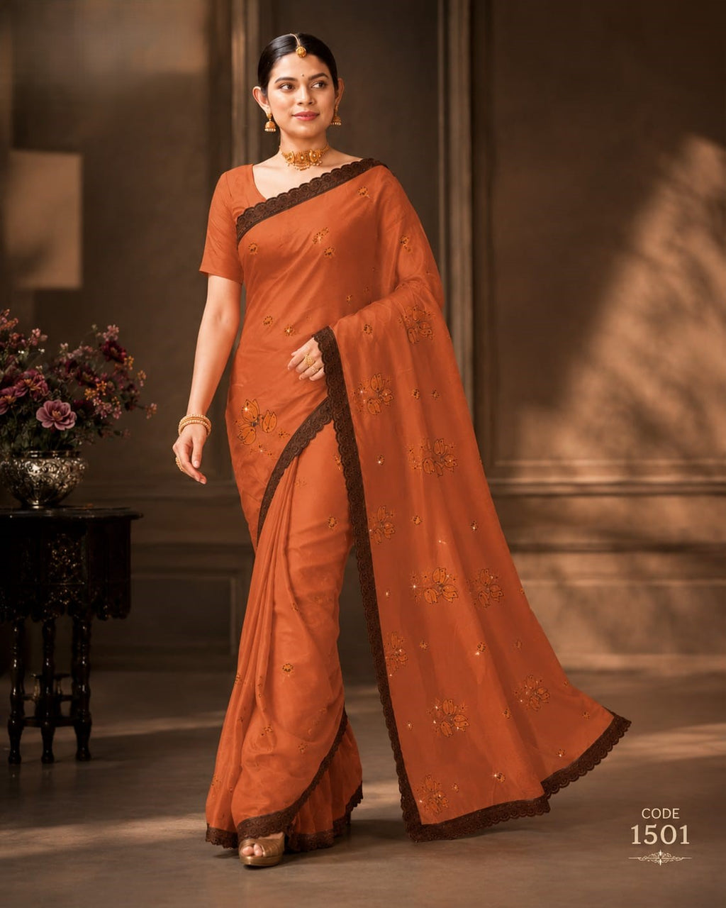 Rust Orange Premium Cotton Blend Saree with Delicate Floral Embroidery and Dark Brown Elegant Lace Border
